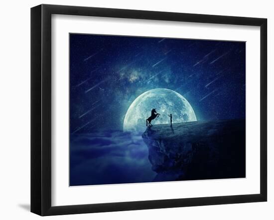 Night Scene with Boy Standing at Edge of Cliff Chasm Trying to Tame Wild Unicorn-Bordeianu Andrei-Framed Photographic Print