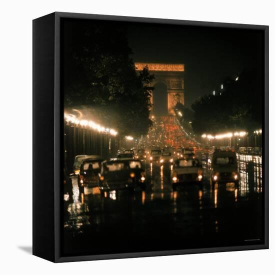 Night Time Traffic Streaming Down the Champs Elysees with the Arc de Triomphe in Background-Ralph Crane-Framed Stretched Canvas
