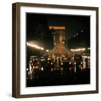 Night Time Traffic Streaming Down the Champs Elysees with the Arc de Triomphe in Background-Ralph Crane-Framed Photographic Print