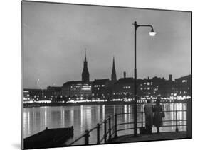 Night Time View of the City of Hamburg, Looking Across River at the New Post War Construction-Walter Sanders-Mounted Photographic Print