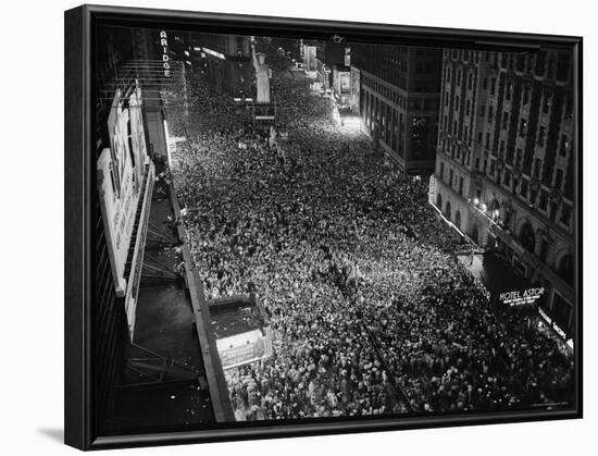 Night View of People Jammed into Times Square Celebrating the End of the War in Europe-Herbert Gehr-Framed Photographic Print
