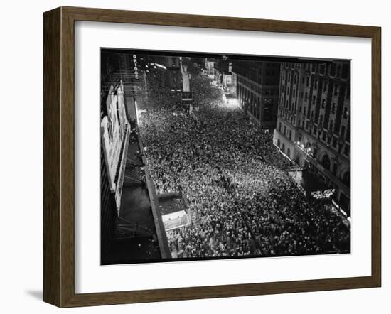 Night View of People Jammed into Times Square Celebrating the End of the War in Europe-Herbert Gehr-Framed Photographic Print