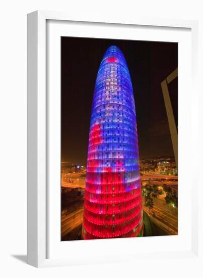 Night view of phallic-shaped Torre Agbar or Abbar Tower in Barcelona, Spain, designed by Jean No...-null-Framed Photographic Print