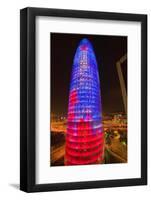 Night view of phallic-shaped Torre Agbar or Abbar Tower in Barcelona, Spain, designed by Jean No...-null-Framed Photographic Print