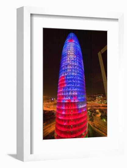 Night view of phallic-shaped Torre Agbar or Abbar Tower in Barcelona, Spain, designed by Jean No...-null-Framed Photographic Print