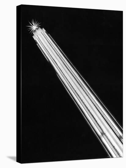 Night View of Slender Tower Lit with Vertical Lines of Light Resembling Giant Fluorescent Tubes-Alfred Eisenstaedt-Stretched Canvas