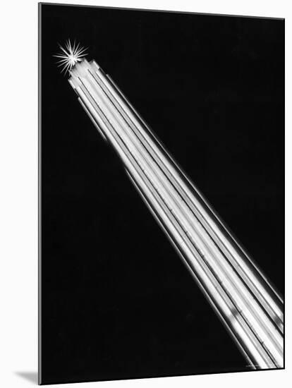 Night View of Slender Tower Lit with Vertical Lines of Light Resembling Giant Fluorescent Tubes-Alfred Eisenstaedt-Mounted Photographic Print