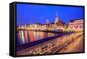 Night View of Typical Houses and the Cathedral Reflected in River Trave, Lubeck, Schleswig Holstein-Roberto Moiola-Framed Stretched Canvas