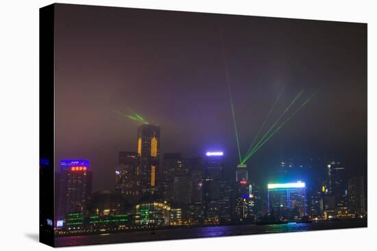 Nightly Light Show of the City of Hong Kong Draped in Fog-Terry Eggers-Stretched Canvas