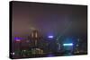 Nightly Light Show of the City of Hong Kong Draped in Fog-Terry Eggers-Stretched Canvas