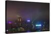 Nightly Light Show of the City of Hong Kong Draped in Fog-Terry Eggers-Stretched Canvas