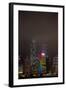 Nightly Light Show of the City of Hong Kong Draped in Fog-Terry Eggers-Framed Photographic Print