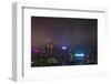 Nightly Light Show of the City of Hong Kong Draped in Fog-Terry Eggers-Framed Photographic Print