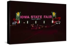Nighttime View of the Illuminate Neon Sign at the Entrance to the Iowa State Fair, 1955-John Dominis-Stretched Canvas