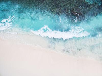 Beautiful Tropical White Empty Beach and Sea Waves Seen from Above