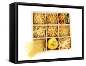 Nine Types Of Pasta In Wooden Box Sections Isolated On White-Yastremska-Framed Stretched Canvas