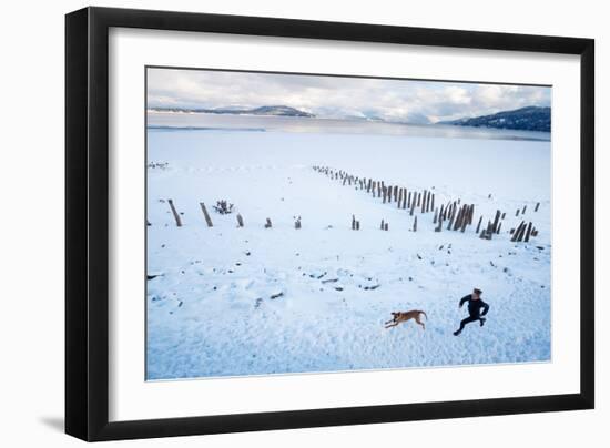 Noelle Zmuda And Her Dog Tink Go For A Cold Winter Run On Pond Oreille Bay Trail, Sandpoint, Idaho-Ben Herndon-Framed Photographic Print