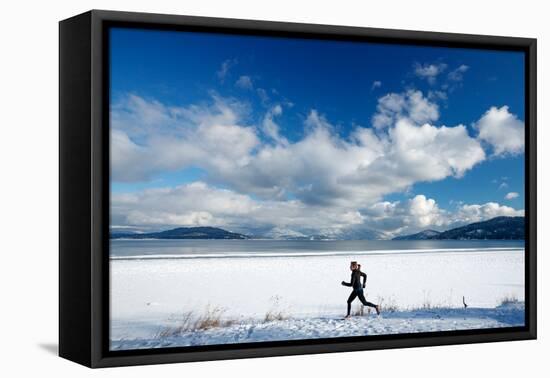 Noelle Zmuda Goes For Winter Run On The Pond Oreille Bay Trail, Sandpoint, Idaho. Lake Pend Oreille-Ben Herndon-Framed Stretched Canvas