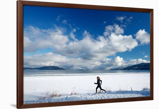 Noelle Zmuda Goes For Winter Run On The Pond Oreille Bay Trail, Sandpoint, Idaho. Lake Pend Oreille-Ben Herndon-Framed Photographic Print