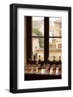 Nogaro, Gers Department, Midi-Pyrenees, France. Bottles of armagnac ready for tasting at the cel...-null-Framed Photographic Print