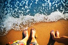 Male and Female Feet are Standing on the Sandy Beach-Nomad Soul-Photographic Print