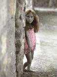 Young Girl Standing Against a Stone Wall-Nora Hernandez-Giclee Print