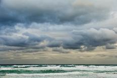 Overcast Sky above Waves Breaking at Beach-Norbert Schaefer-Photographic Print