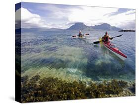 Nordland, Helgeland, Sea Kayakers Explore Calm Coastal Waters of Southern Nordland, Norway-Mark Hannaford-Stretched Canvas