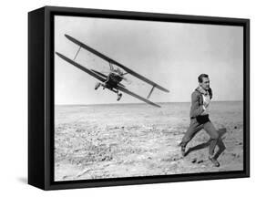 NORTH BY NORTHWEST, 1959 directed by ALFRED HITCHCOCK Cary Grant (b/w photo)-null-Framed Stretched Canvas
