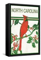 North Carolina - Cardinal Perched on a Holly Branch-Lantern Press-Framed Stretched Canvas