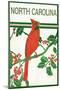 North Carolina - Cardinal Perched on a Holly Branch-Lantern Press-Mounted Art Print