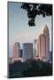 North Carolina, Charlotte, Elevated View of the City Skyline at Dusk-Walter Bibikow-Mounted Photographic Print
