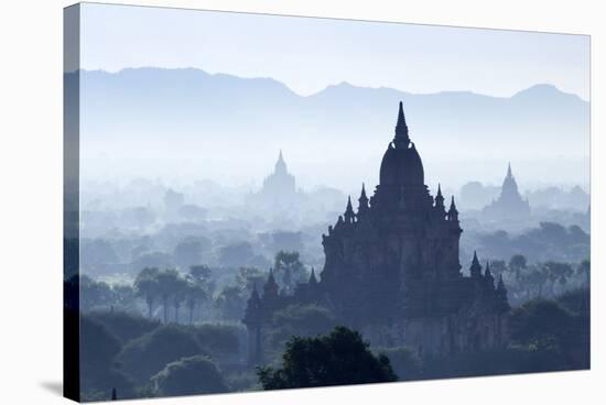 North Guni Temple, Pagodas and Stupas in Early Morning Mist at Sunrise, Bagan (Pagan)-Stephen Studd-Stretched Canvas