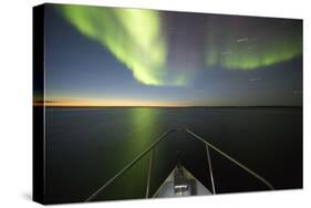Northern Lights above Expedition Boat, Nunavut, Canada-Paul Souders-Stretched Canvas