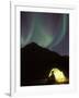 Northern Lights and Camper Outside Tent, Brooks Range, Arctic National Wildlife Refuge, Alaska, USA-Steve Kazlowski-Framed Photographic Print