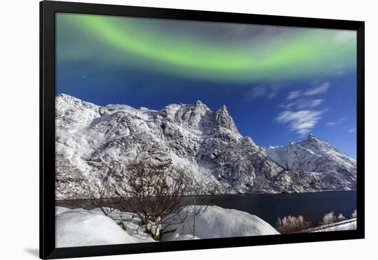 Northern Lights (Aurora Borealis) Illuminate the Snowy Peaks and the Blue Sky During a Starry Night-Roberto Moiola-Framed Photographic Print