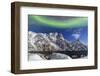 Northern Lights (Aurora Borealis) Illuminate the Snowy Peaks and the Blue Sky During a Starry Night-Roberto Moiola-Framed Photographic Print