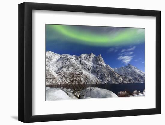 Northern Lights (Aurora Borealis) Illuminate the Snowy Peaks and the Blue Sky During a Starry Night-Roberto Moiola-Framed Photographic Print