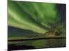 Northern Lights over Flakstadoya. The Lofoten Islands in northern Norway during winter.-Martin Zwick-Mounted Photographic Print