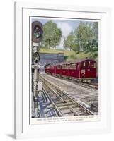 Northern Line Train on It's Way to Kennington Via Charing Cross Emerges Overground from a Tunnel-Raymond Way-Framed Art Print