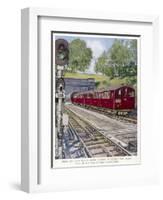 Northern Line Train on It's Way to Kennington Via Charing Cross Emerges Overground from a Tunnel-Raymond Way-Framed Art Print