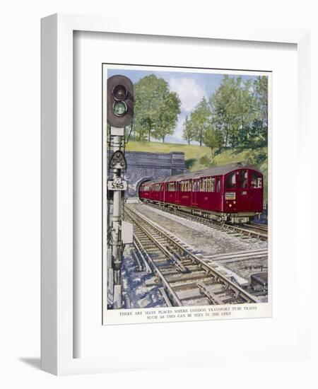 Northern Line Train on It's Way to Kennington Via Charing Cross Emerges Overground from a Tunnel-Raymond Way-Framed Art Print