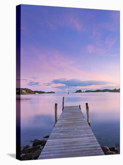 Norway, Oslo, Oslo Fjord, Jetty over Lake at Dusk-Shaun Egan-Stretched Canvas