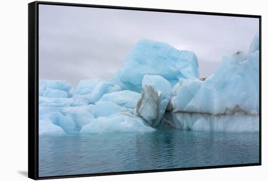 Norway. Svalbard. Brasvelbreen. Turquoise Ice Bergs in the Calm Water-Inger Hogstrom-Framed Stretched Canvas