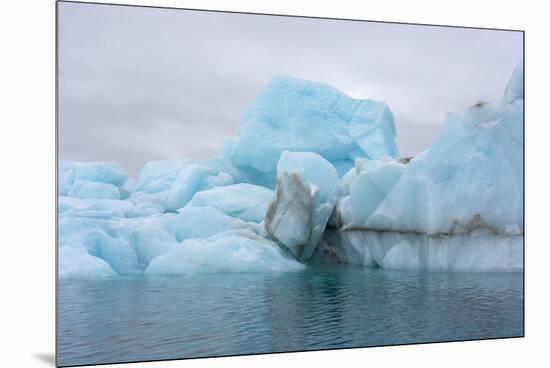Norway. Svalbard. Brasvelbreen. Turquoise Ice Bergs in the Calm Water-Inger Hogstrom-Mounted Premium Photographic Print