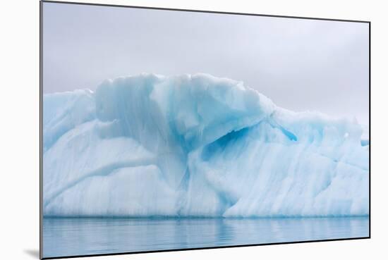 Norway. Svalbard. Brasvelbreen. Turquoise Ice Bergs in the Calm Water-Inger Hogstrom-Mounted Photographic Print