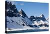 Norway. Svalbard. Hornsund. Dramatic Cliffs Tower over the Sound-Inger Hogstrom-Stretched Canvas