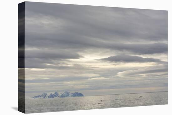 Norway. Svalbard. Krossfjord. Cloudy Skies-Inger Hogstrom-Stretched Canvas