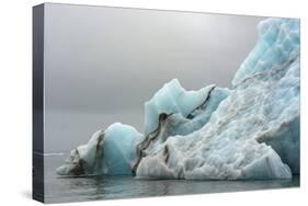 Norway. Svalbard. Spitsbergen. Brepollen. Iceberg with Moraine Dust-Inger Hogstrom-Stretched Canvas