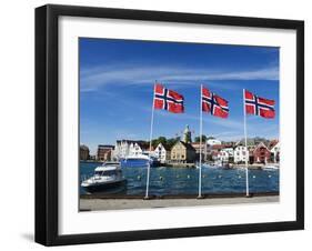 Norwegian Flags and Historic Harbour Warehouses, Stavanger, Norway, Scandinavia, Europe-Christian Kober-Framed Premium Photographic Print